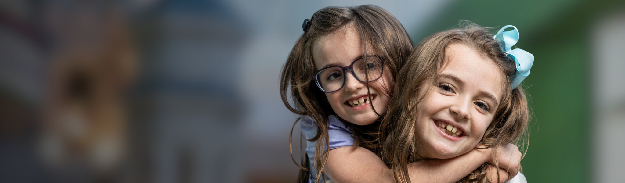Gabby and her sister hugging in Arnold Palmer Hospital
